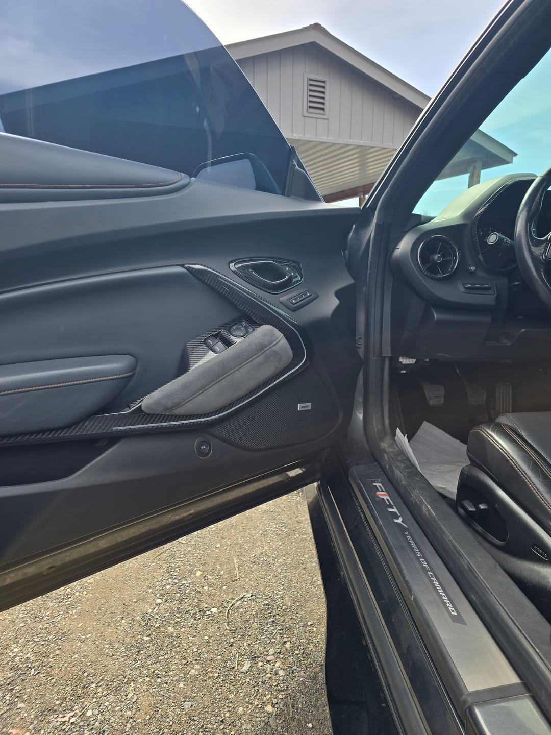Customer photo review of 2016-2024 Camaro Real Carbon Fiber Interior Door Panel Chrome Trim Cover