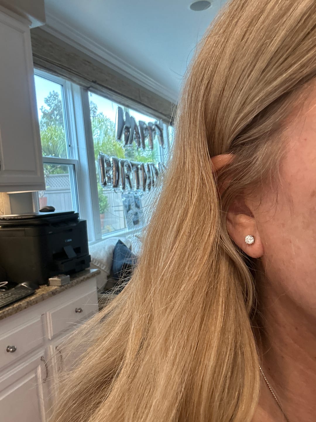 Customer photo review of Round Solitaire Stud Earrings - Moissanites