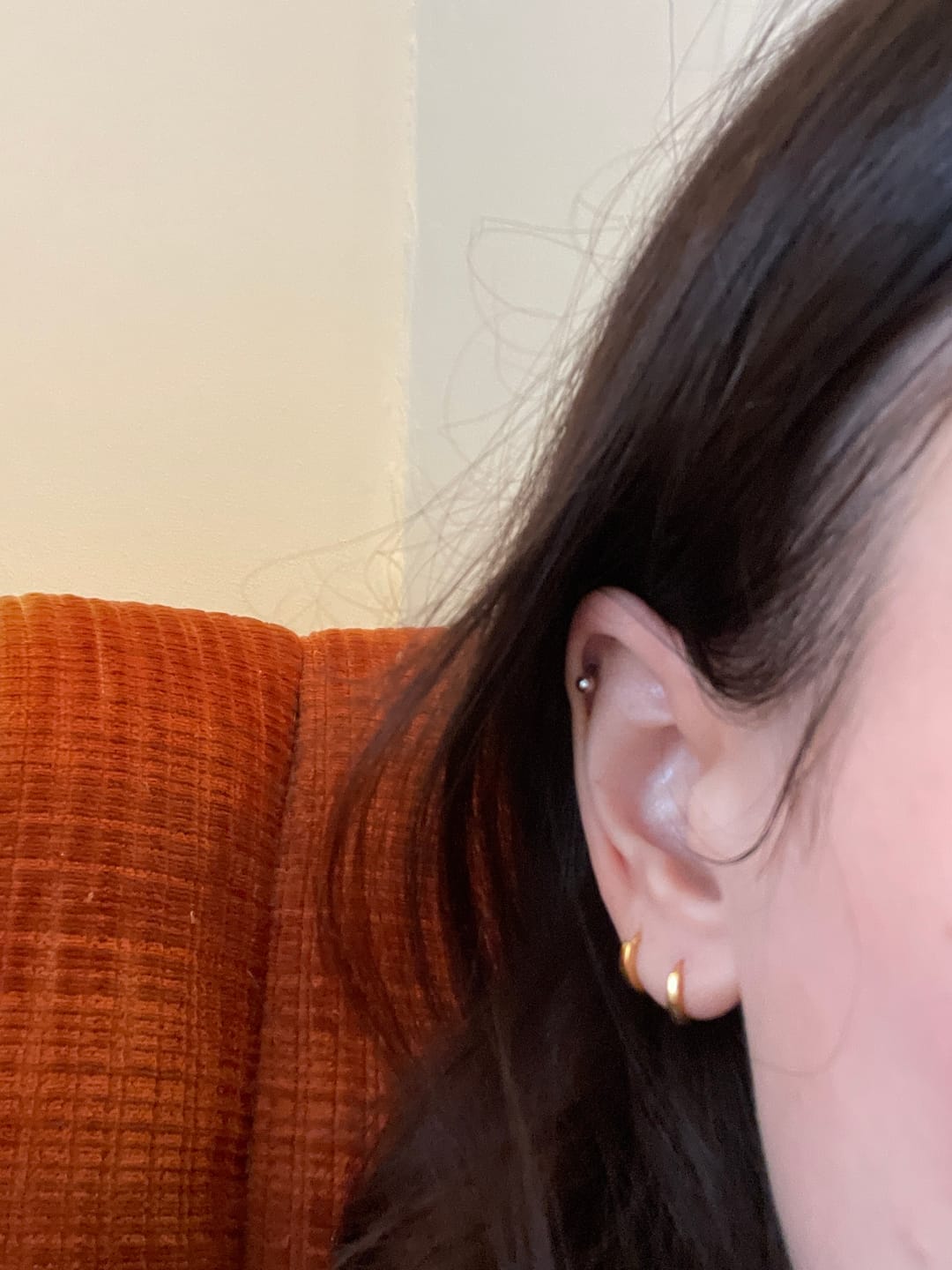 Customer photo review of Ash Micro Huggie Hoop Earrings