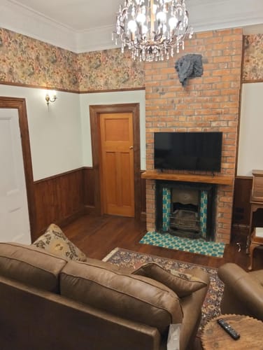 Customer photo review of Thalia - Peacock Distressed Concrete Wallpaper - Multi