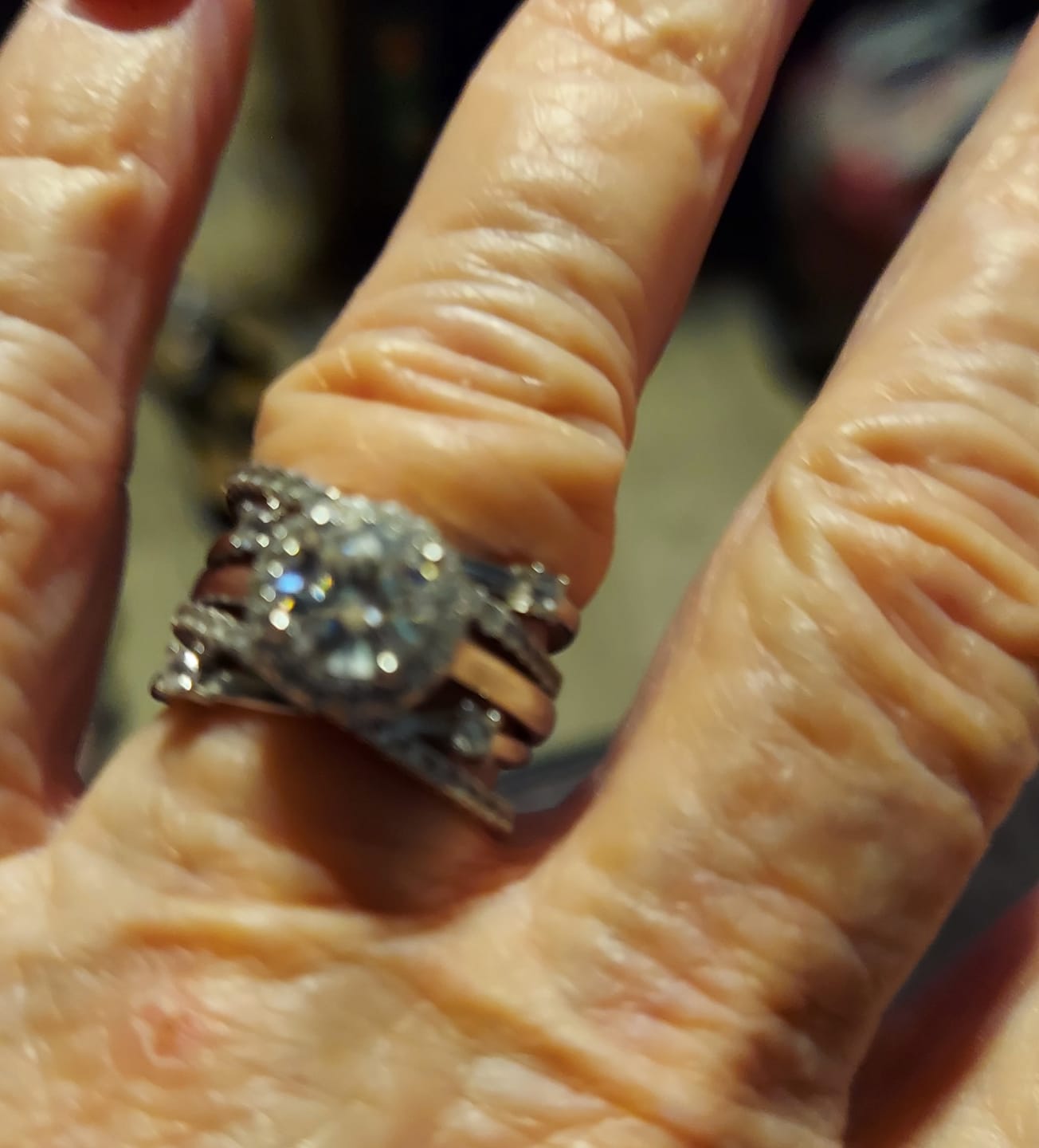 Customer photo review of Halo Moissanite With Enhancer Cross Shank Bridal Engagement Ring Set