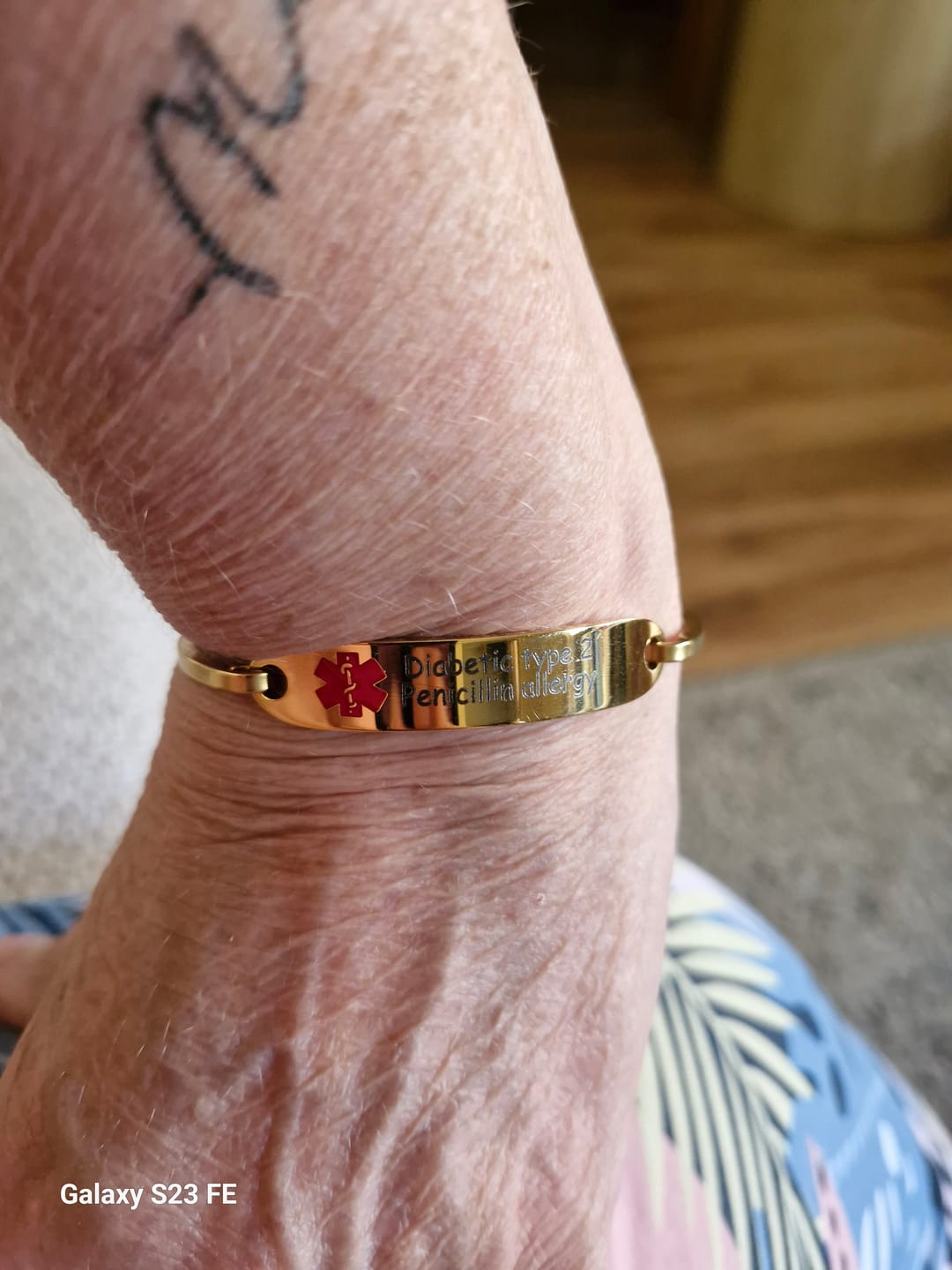 Customer photo review of Personalised Gold Medical Alert ID Bangle Bracelet