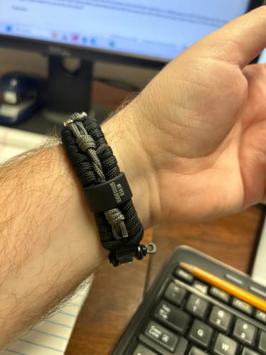 Customer photo review of Never Surrender Barbed Wire Paracord Bracelet: Helps Pair Veterans With A Service Dog Or Shelter Dog