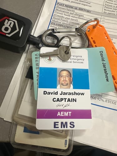 Customer photo review of ONE SHEAR®️ tactical retention leash with belt clip and steel braided line