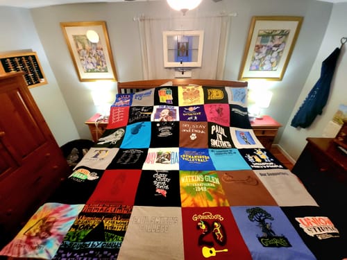 T-shirt quilt with music, community service themes by Lori from NY