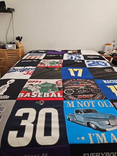 T-shirt quilt with sports, automobiles themes by Herman Michael from AZ