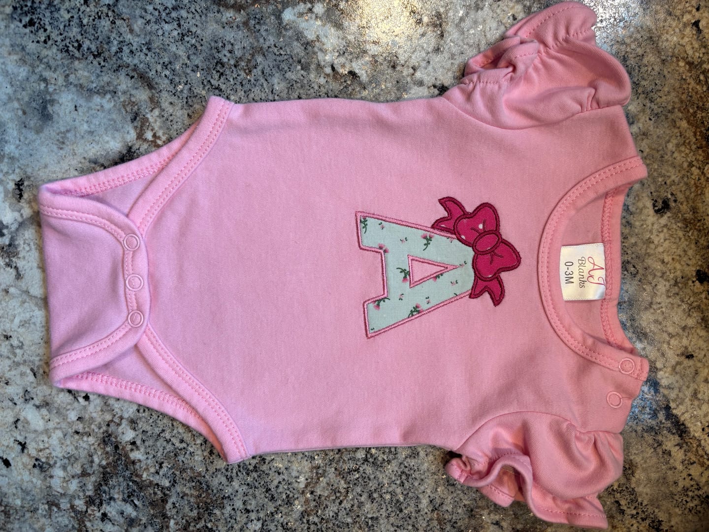 Customer photo review of Girl's Ruffle Short Sleeve Bodysuits