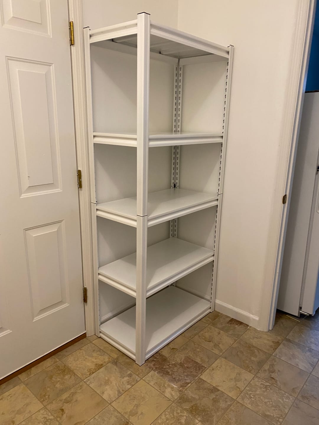 Customer photo review of Raybee 72" White Metal Shelving Unit, 2000lbs Adjustable Storage Shelves, Utility Rack Heavy Duty Shelving