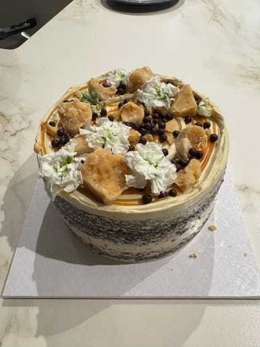 Customer photo review of chocolate caramel cake