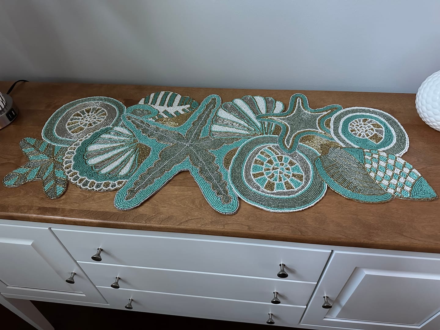 Customer photo review of Ringo Starfish Beaded Table Runner in Teal & Gold