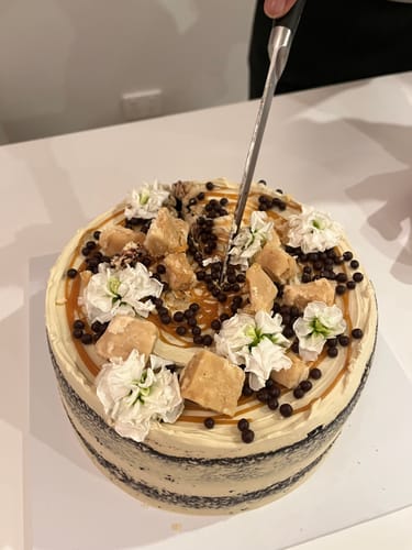 Customer photo review of chocolate caramel cake