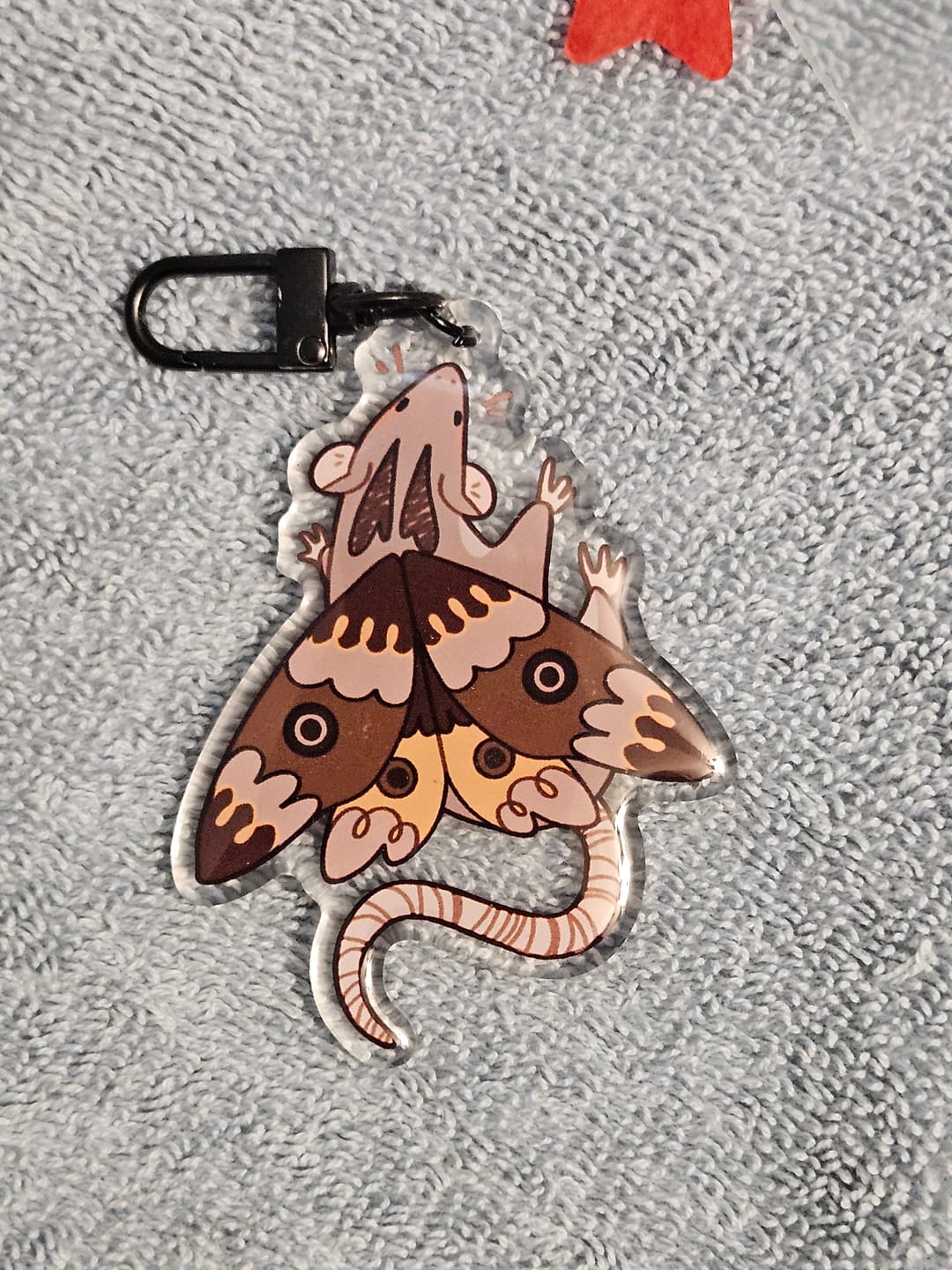 Customer photo review of Mothrat Keychain