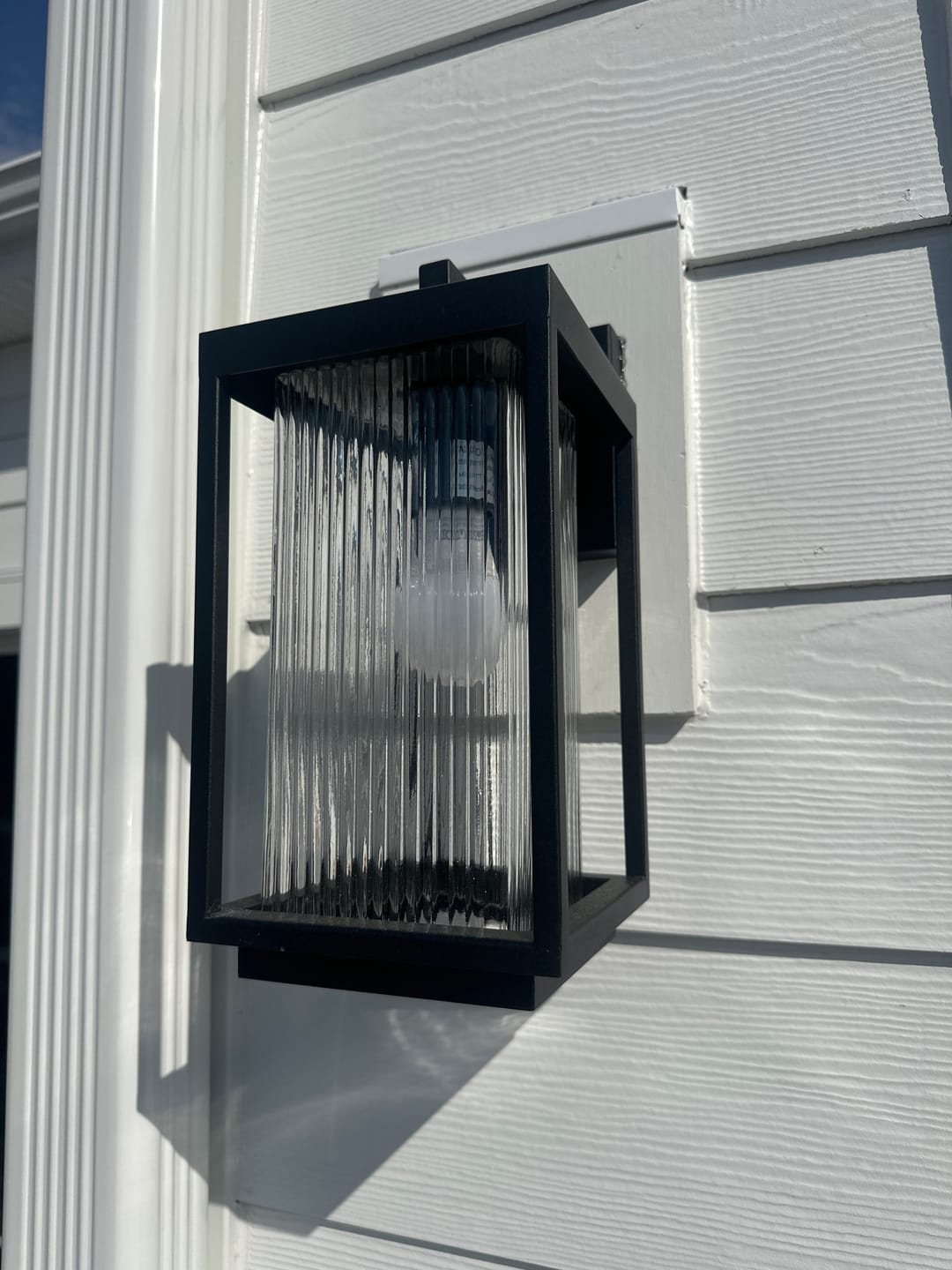 Customer photo review of IP23 1-Light Black Ribbed Glass Outdoor Wall Lantern