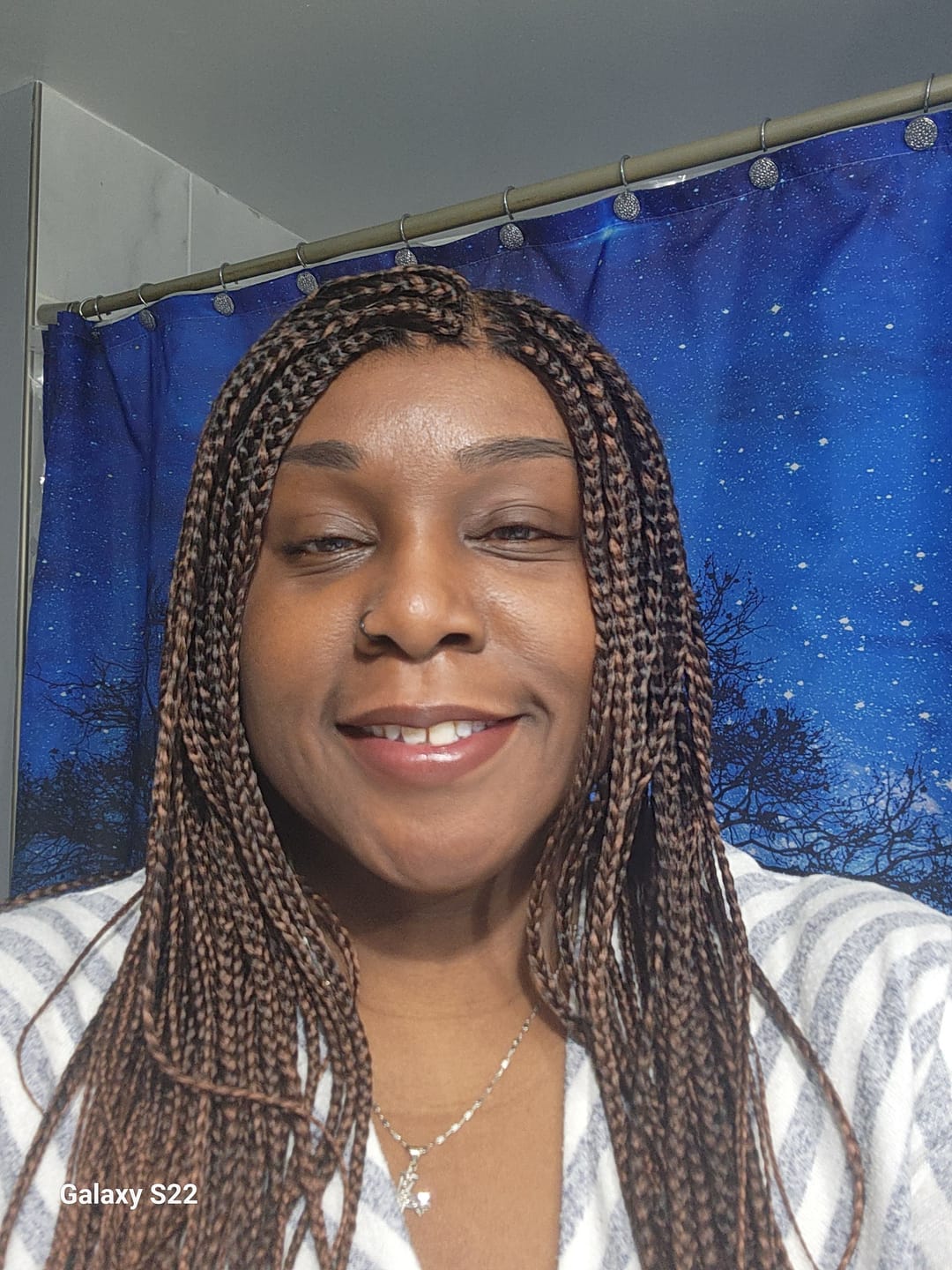 Customer photo review of Kora - Pre Bleached Human Hair Lace Lightweight Knotless Swiss HD Lace Box Braided Wig 100 Strands