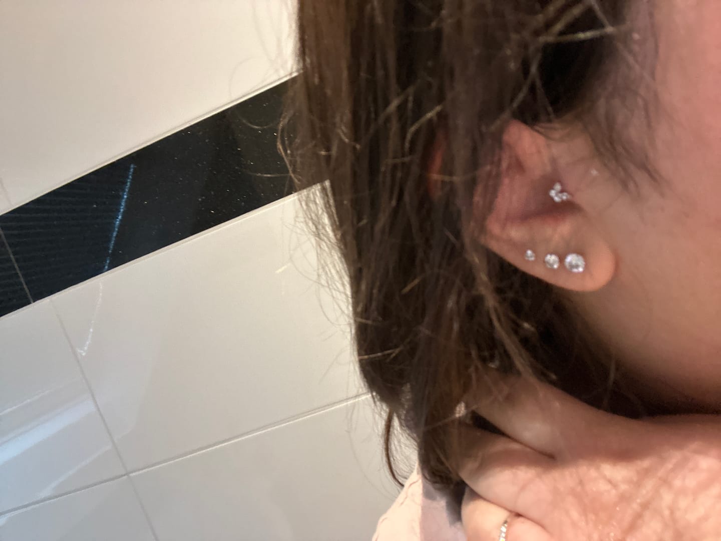 Customer photo review of Butterfly Piercing | Titan