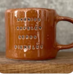 Customer photo review of Rust color mug with good wishes