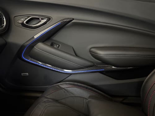 Customer photo review of 2016-2024 Camaro Real Carbon Fiber Interior Door Panel Chrome Trim Cover