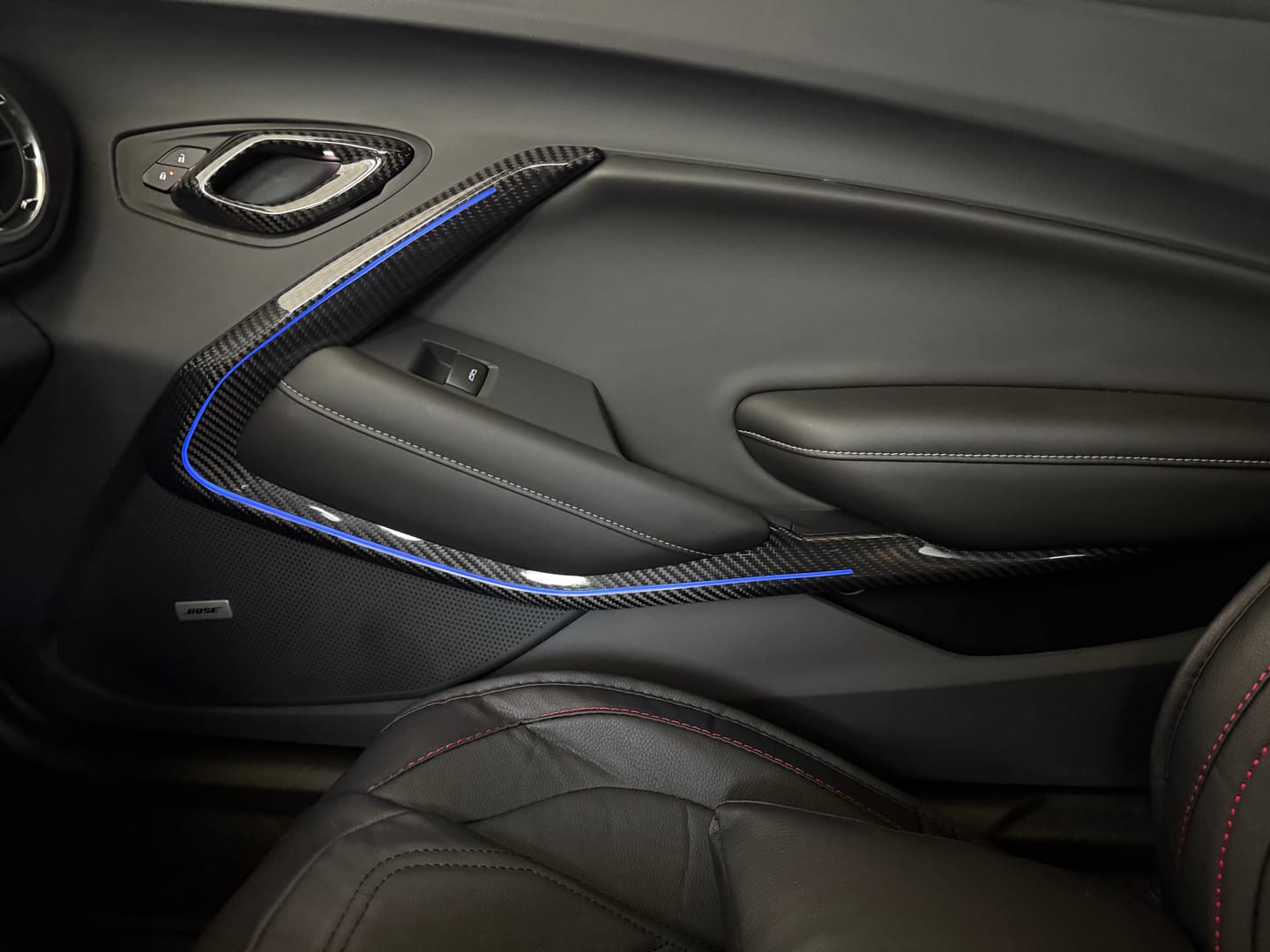 Customer photo review of 2016-2024 Camaro Real Carbon Fiber Interior Door Panel Chrome Trim Cover