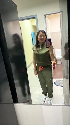 Customer photo review of Zip-Up Polo MoveTech® Scrub Top - Women / Forest Green