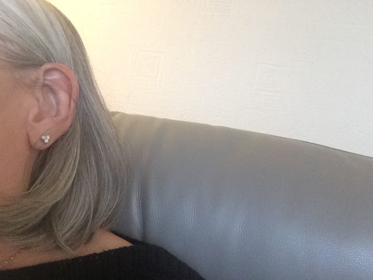 Customer photo review of Trinity Moissanite Sleep Stud Earrings