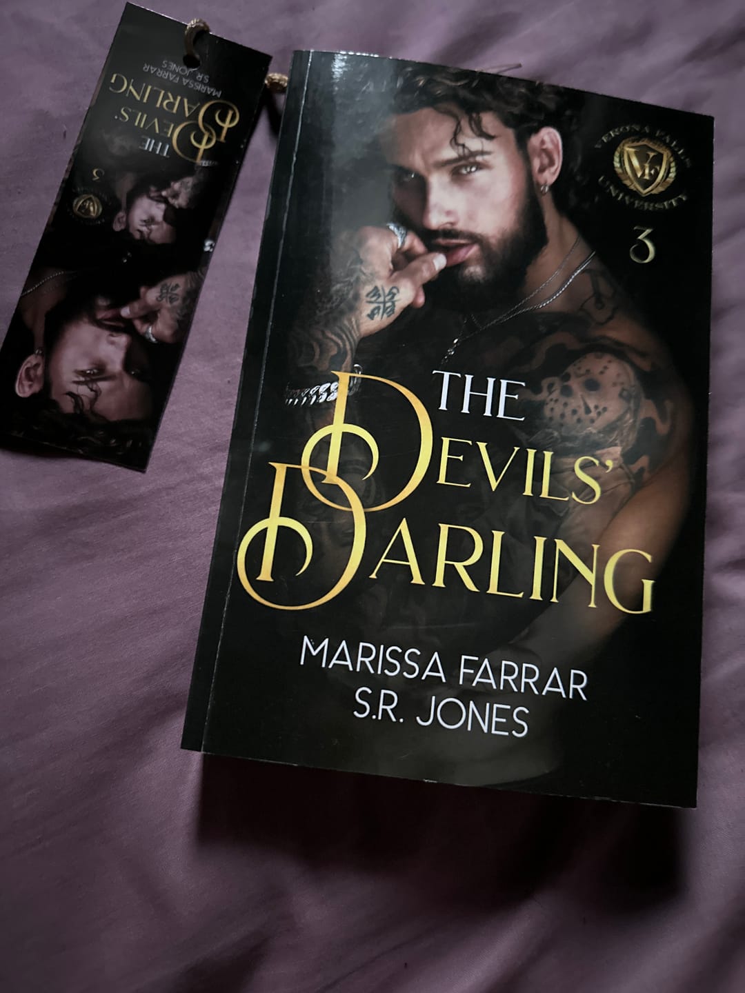 Customer photo review of The Devils' Darling by Marissa Farrar and S.R. Jones PAPERBACK: Dents and Scratches