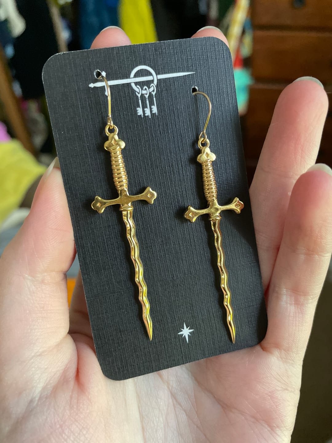 Customer photo review of Wavy Sword Earrings