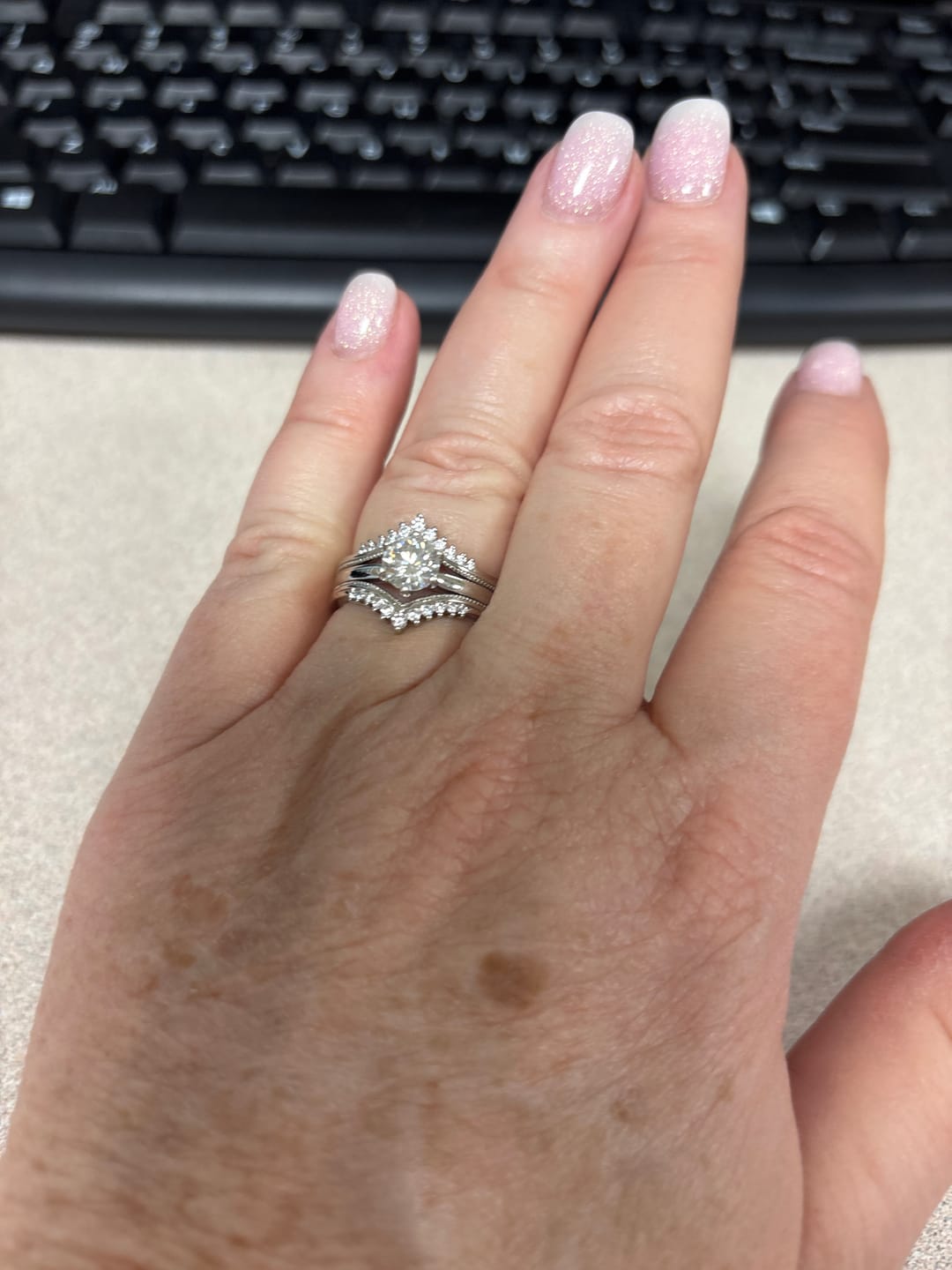 Customer photo review of Solitaire Moissanite With Enhancer Shank Bridal Engagement Ring Set
