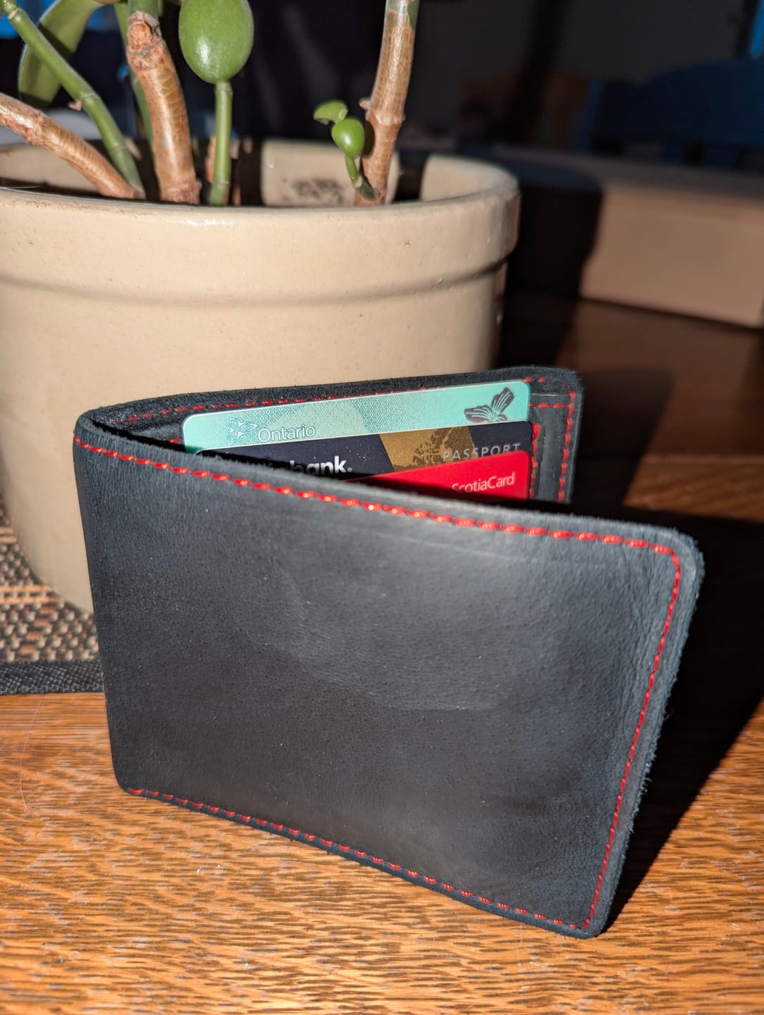 Customer photo review of The Diablo Wallet - Black Full-Grain Leather Wallet with Red Stitching