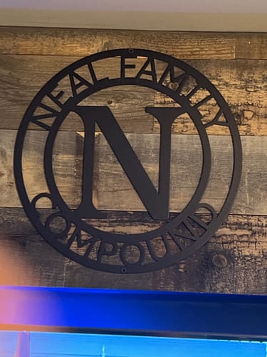 Customer photo review of Letter Family Name - Steel Sign