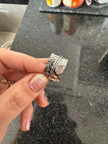 Customer photo review of Rose Quartz Flowers and Butterfly Spinner Ring