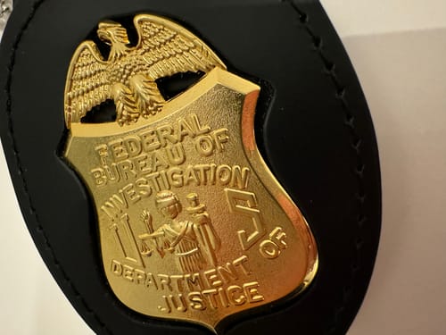 Customer photo review of FBI Special Agent Badge Solid Copper Exact Replica Movie Prop