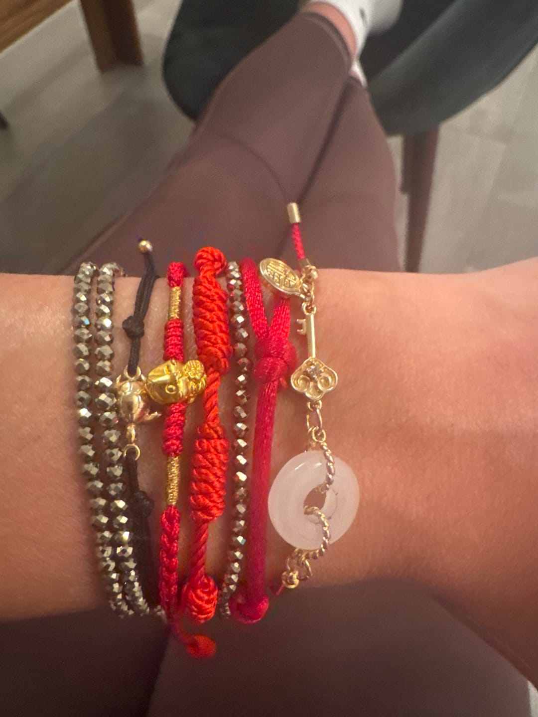 Customer photo review of Buddha Stones 18K Gold Plated Hetian Jade Peace Buckle Fu Character Luck Red Rope Bracelet