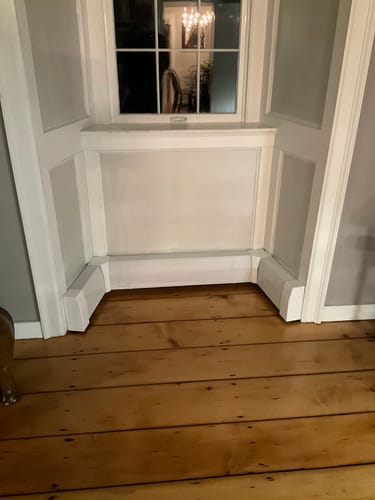 Customer photo review of Standard White Baseboard Covers by the Foot