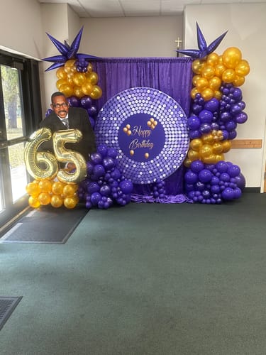 Customer photo review of Black and Gold Circle Backdrop Cover