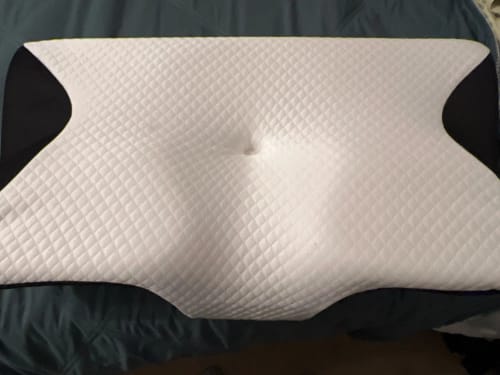 Customer photo review of Ultimate Ergonomic Neck Pillow - 2-in-1 Contour Memory Foam Support for Pain Relief