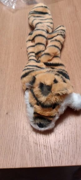 Customer photo review of Simulated Animal Stuffingless Plush Squeaky Dog Toy