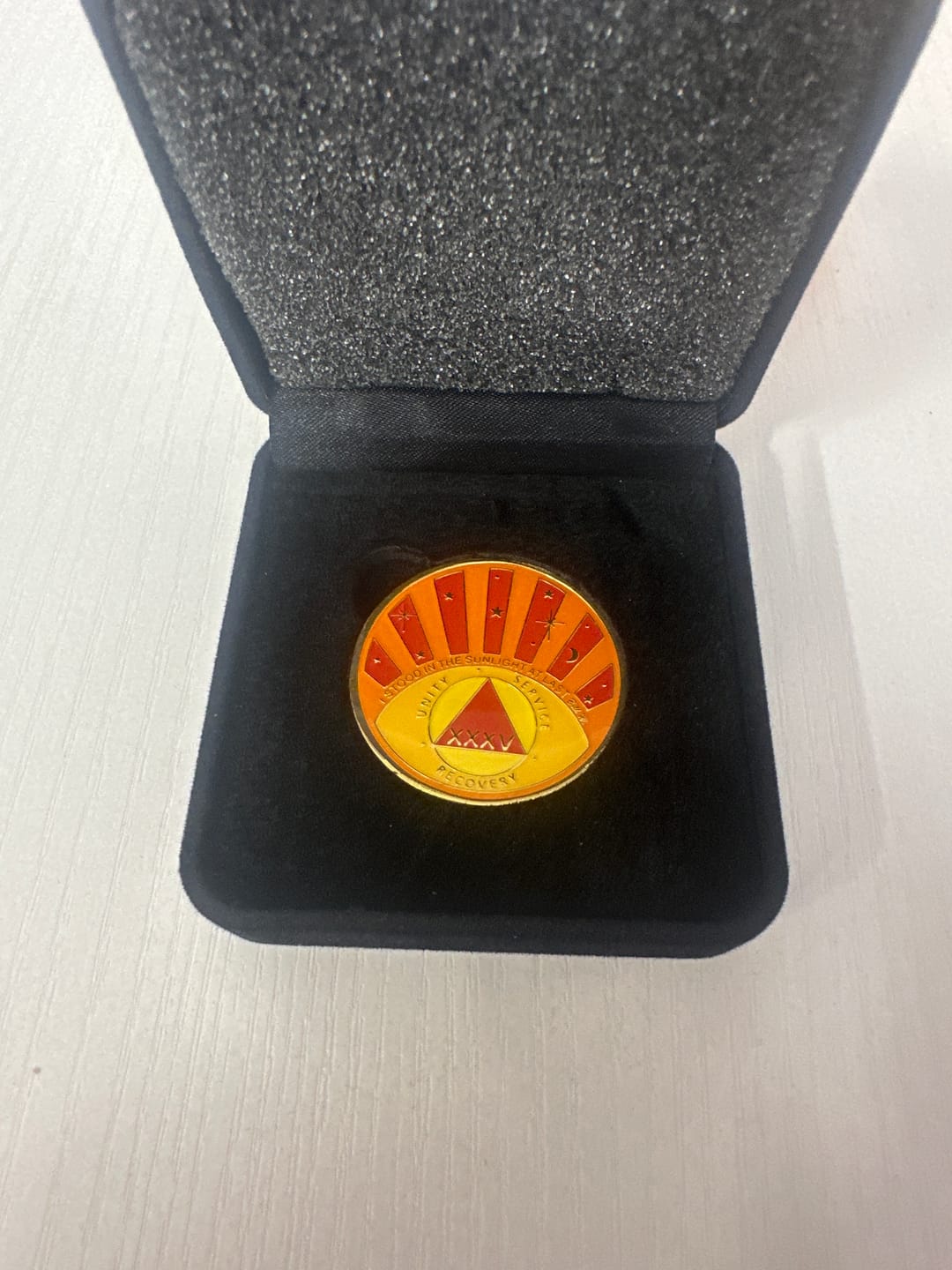 Customer photo review of Stood in the Sunlight 35 Year Specialty AA Recovery Medallion - Tri-Plated Thirty-Five Year Chip/Coin + Velvet Case