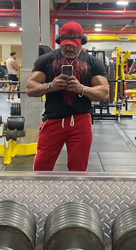 Customer photo review of Ruthless Hustle Tee (Orange Logo)