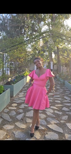 Customer photo review of FINAL SALE - Bad Girl Skater Skirt in Flamingo Pink Vegan Leather - Vixen by Micheline Pitt
