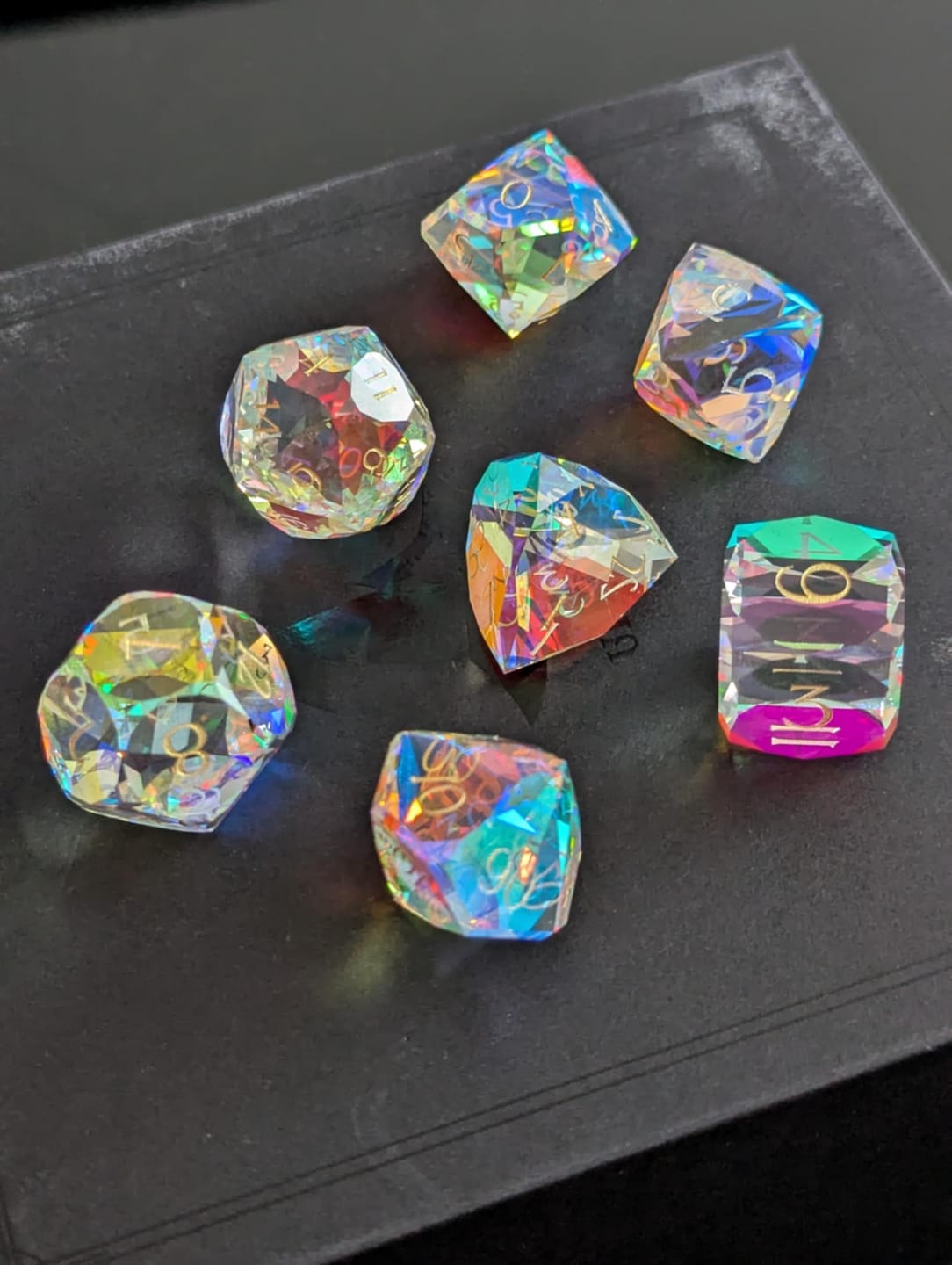 Customer photo review of URWizards D&D Multi-faceted Prism Glass Engraved Dice Set