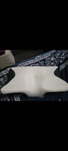 Customer photo review of Ultimate Ergonomic Neck Pillow - 2-in-1 Contour Memory Foam Support for Pain Relief