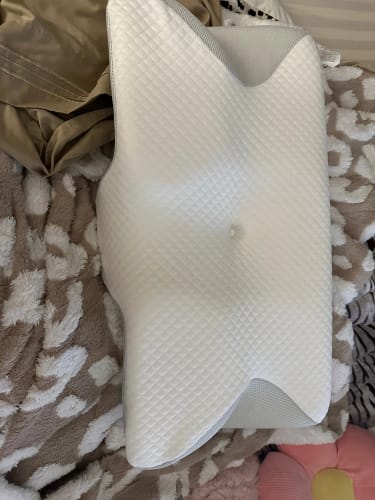 Customer photo review of Ultimate Ergonomic Neck Pillow - 2-in-1 Contour Memory Foam Support for Pain Relief