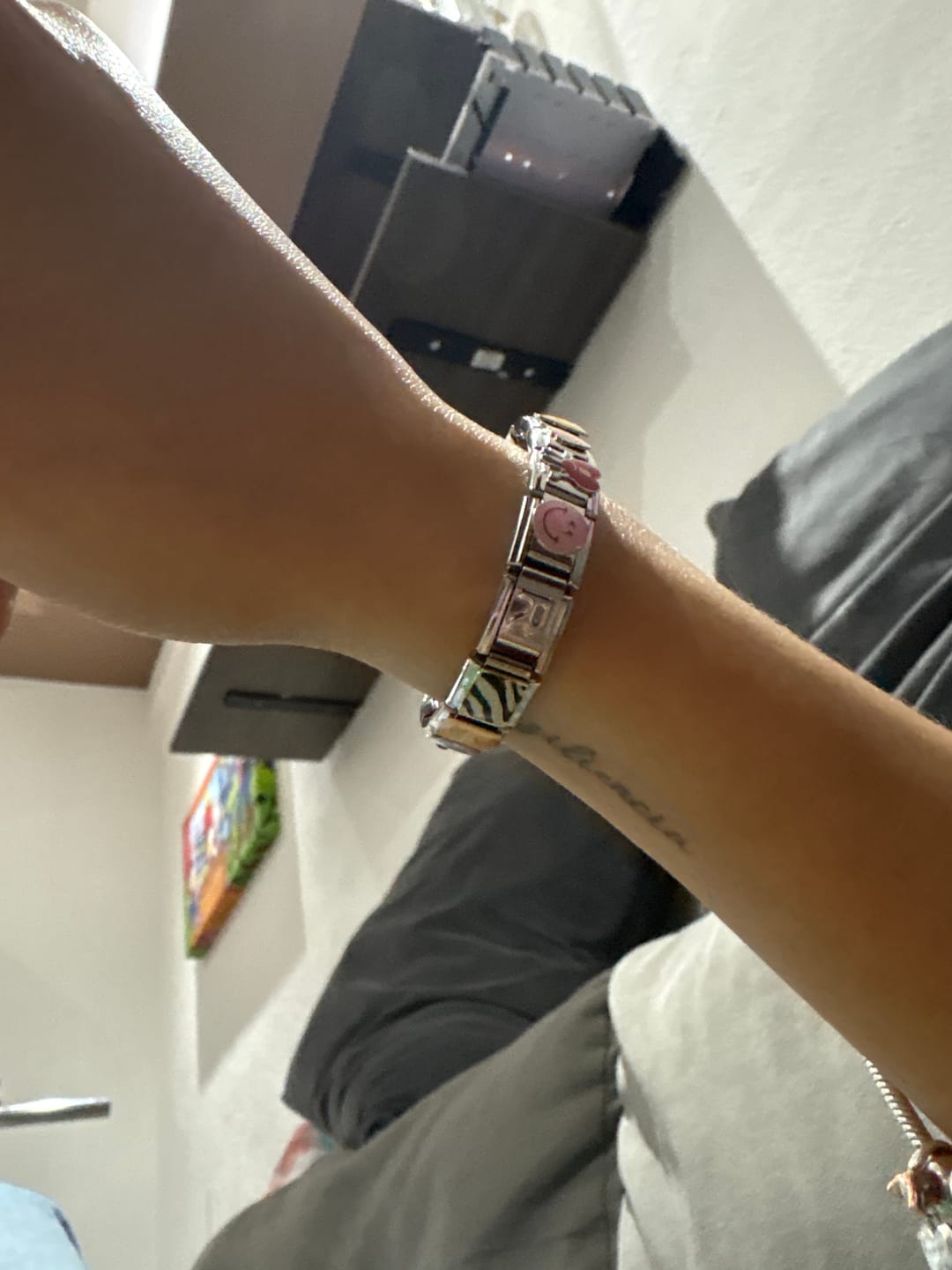 Customer photo review of Charm Inicial Plateada
