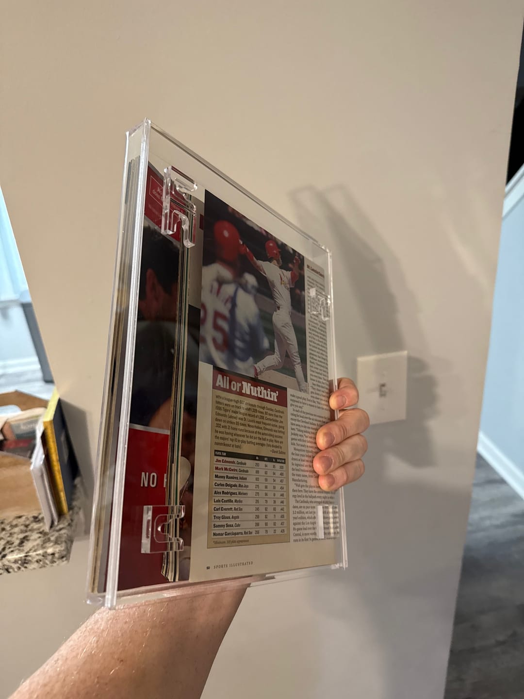 Customer photo review of Clear Acrylic Display Case for Collectible Magazine or Comic Book