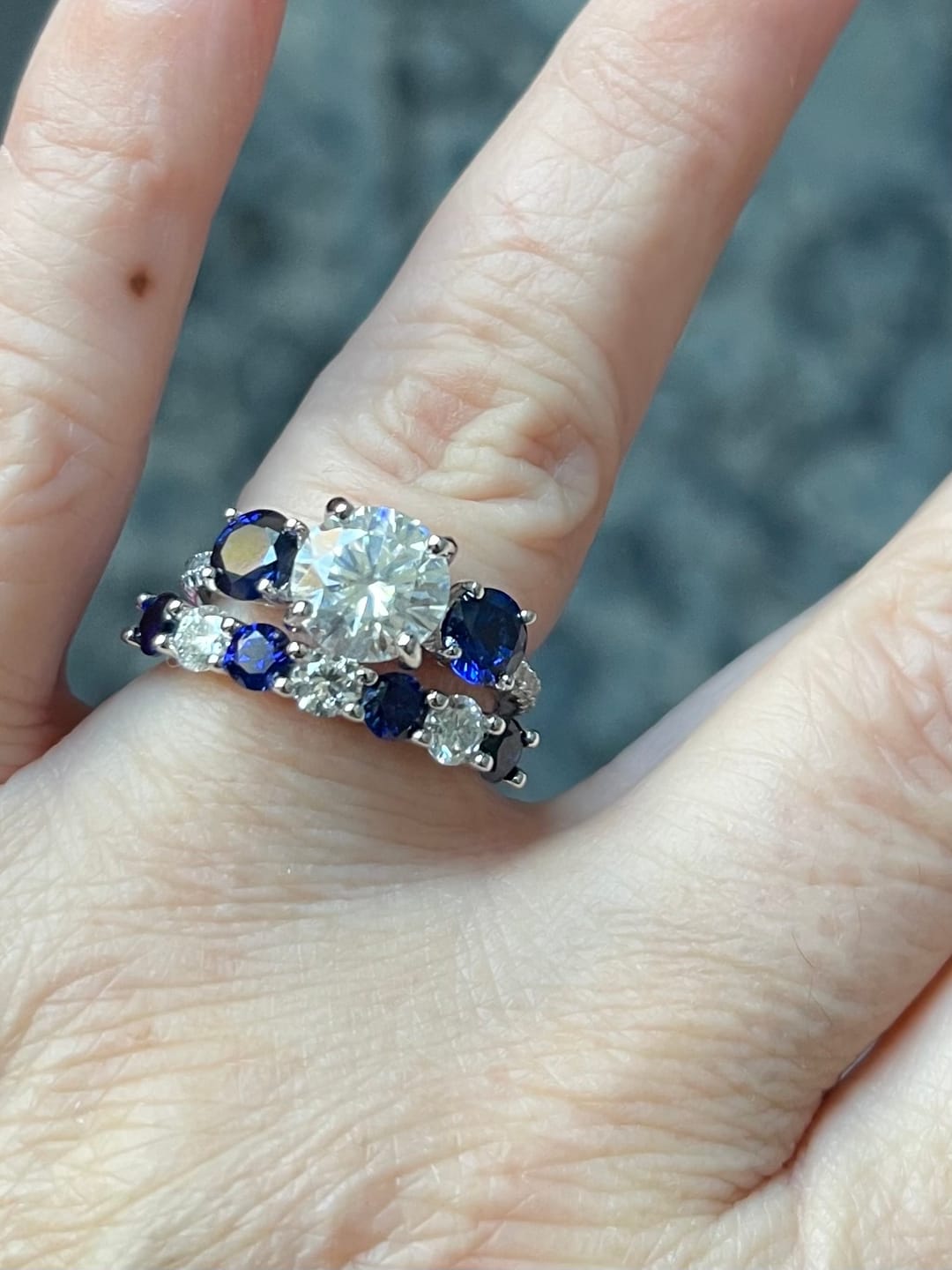 Customer photo review of Three Stone Moissanite and Blue Sapphire Pave Engagement Ring