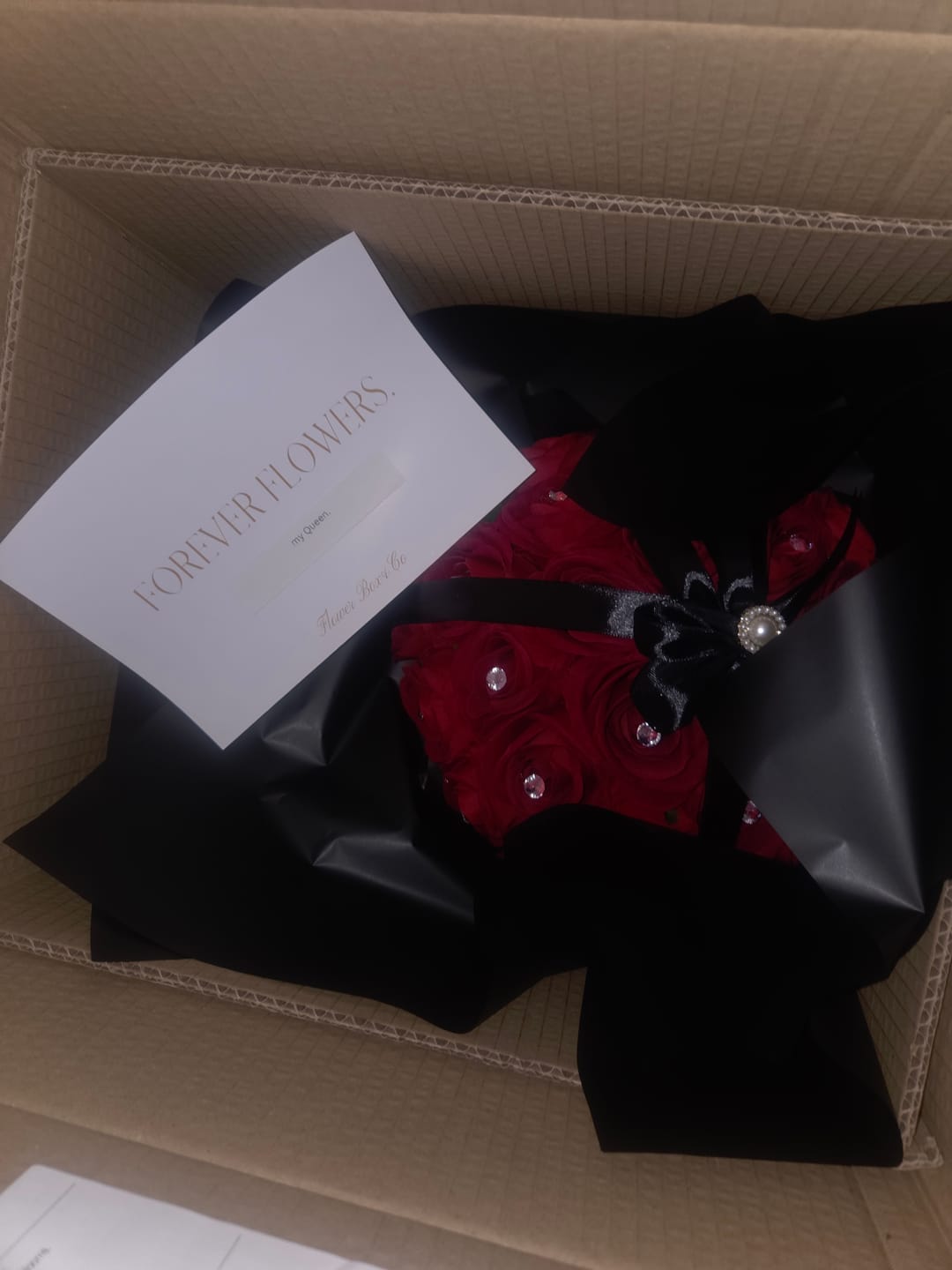 Customer photo review of 24 Red Forever Roses Black