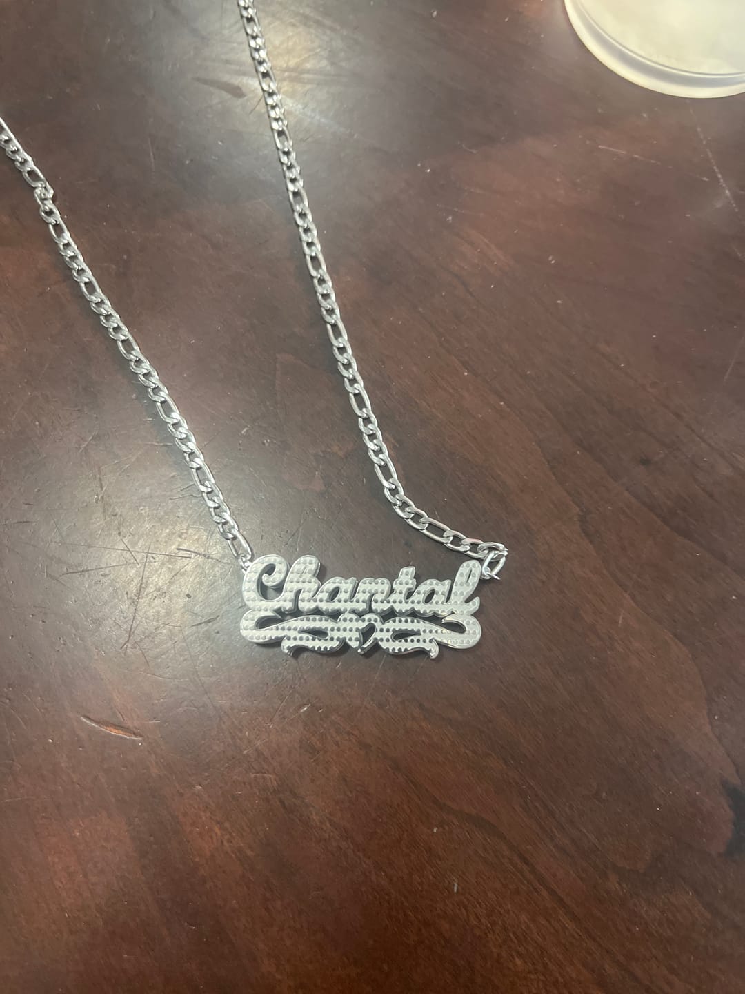 Customer photo review of Double Plated Heart Twirl Name Necklace w/ Figaro Chain