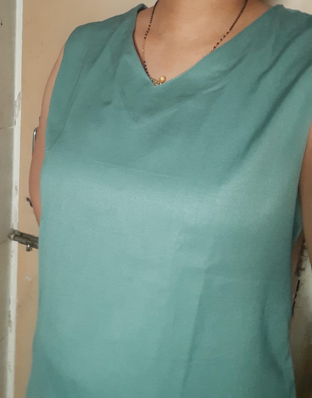 Customer photo review of Jade V-Neck Sleeveless Top