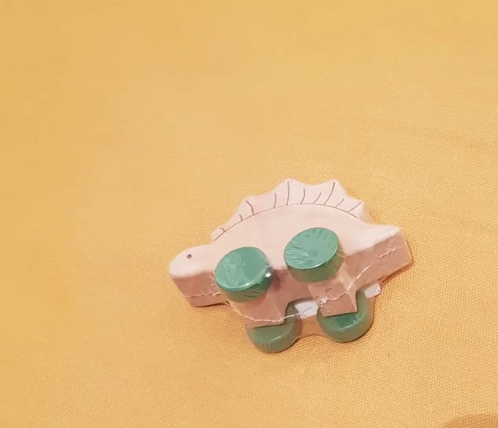 Customer photo review of Beech Wooden Dinosaur On Wheels