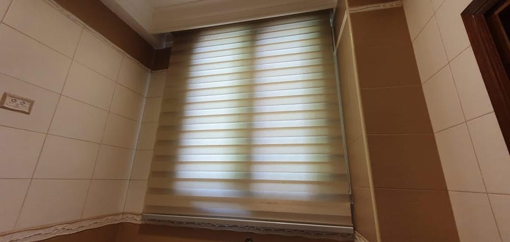 Customer photo review of Tisa Signature Light Filtering Zebra Blinds